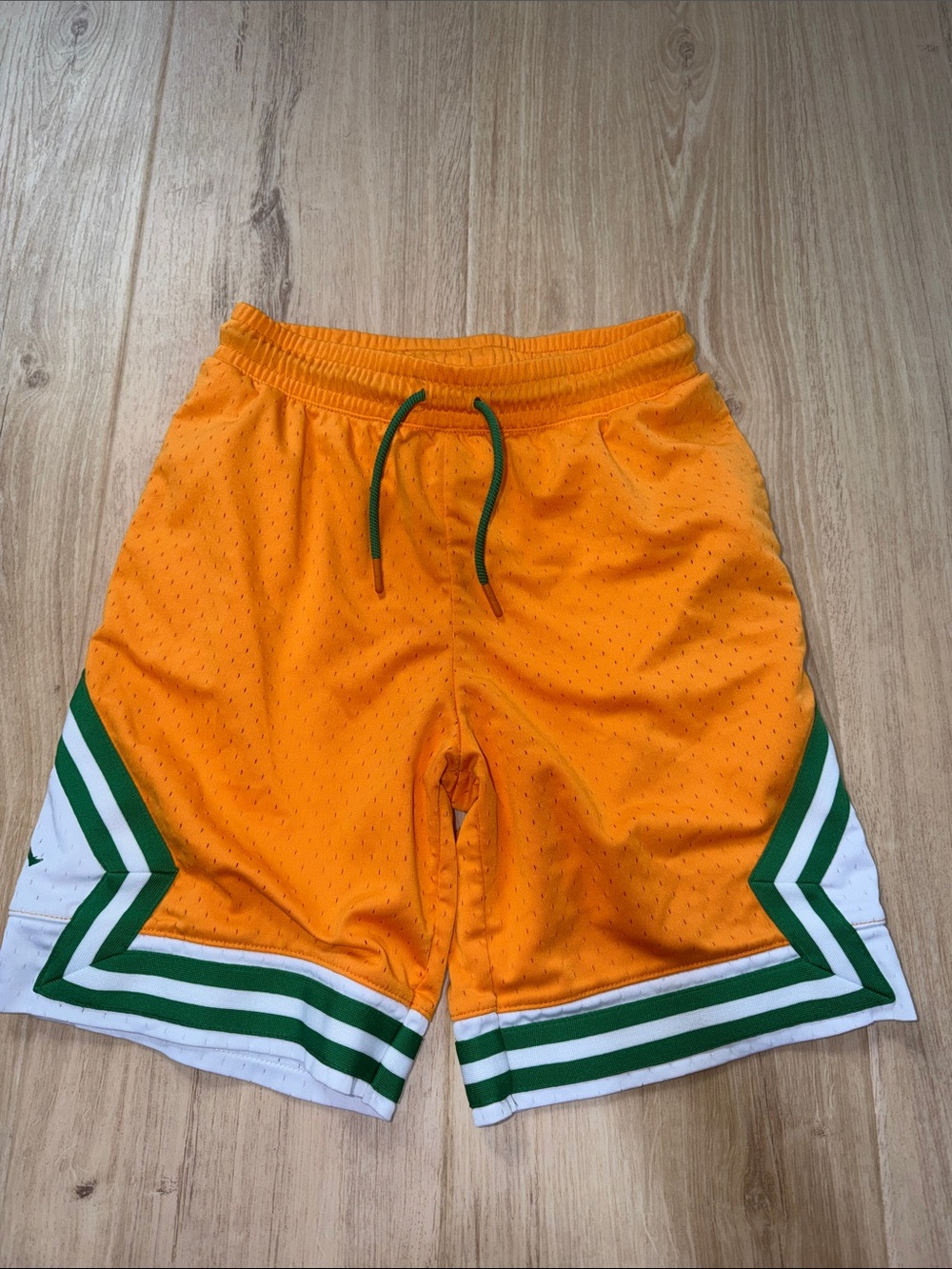 Jordan Orange Athletic Mesh Shorts with Green Trim - youth size large